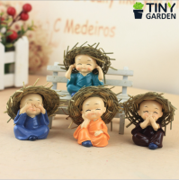 Chú tiểu 4 không (đội nón)