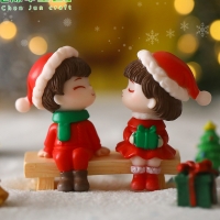 Cặp đôi Giáng Sinh ngồi
